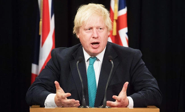 Britain's Foreign Secretary Boris Johnson speaks to the media during a joint press conference with the minister of foreign Affairs Gerry Brownlee at Parliament in Wellington, New Zealand on Tuesday. (AFP)