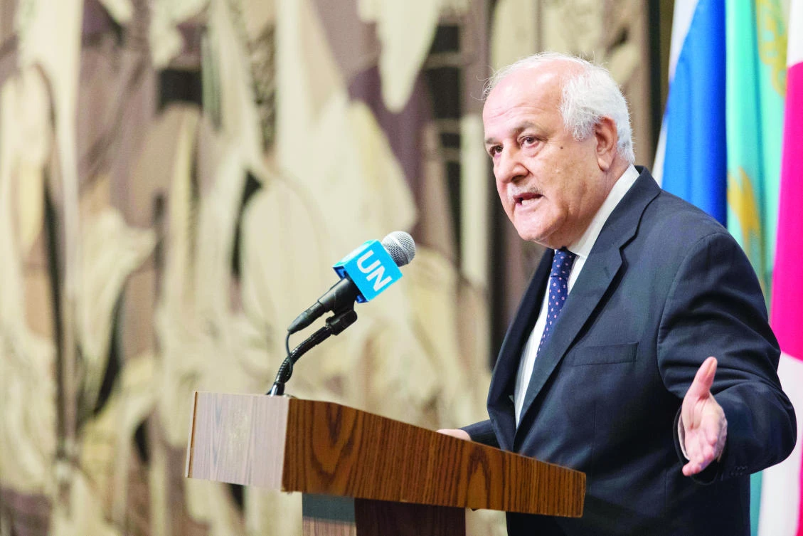 Riyad Mansour, Palestinian ambassador to the UN, speaks to reporters outside the UN Security Council chambers in New York Monday. (AP)