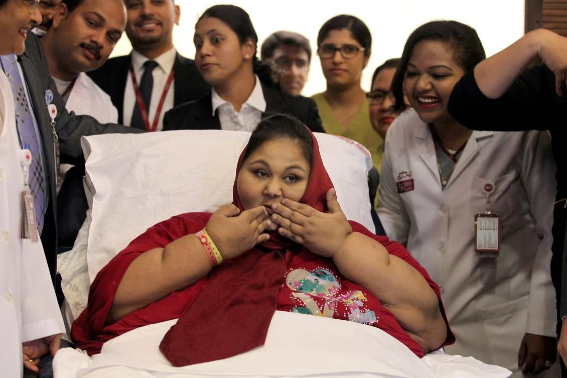 Egyptian national Eman Ahmed Abd El Aty blows a kiss during a press conference on July 24, 2017 at the Burjeel Hospital in Abu Dhabi where she is receiving treatment following drastic weight-loss surgery. Aty once believed to be the 'world's heaviest woman' arrived in Abu Dhabi from India earlier in the year to continue to her treatment. (AFP)