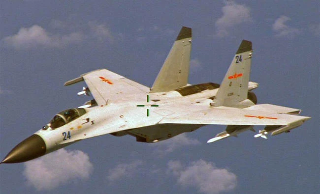 A Chinese J-11 fighter flies in this file photo. (Reuters)