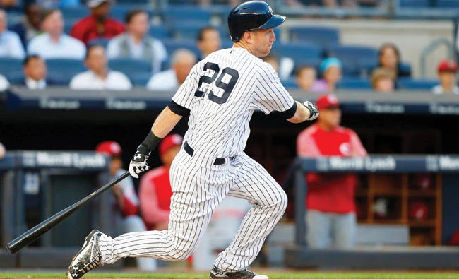 Todd Frazier of the New York Yankees ground into a second inning run-scoring triple play against the Cincinnati Reds at Yankee Stadium on Tuesday in the Bronx borough of New York City. (AFP)