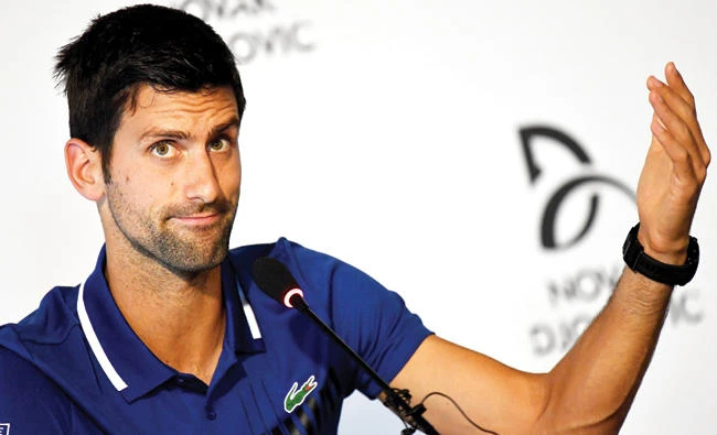 Serbian tennis player Novak Djokovic gestures as he speaks during a press conference in Belgrade on Wednesday. (AFP)