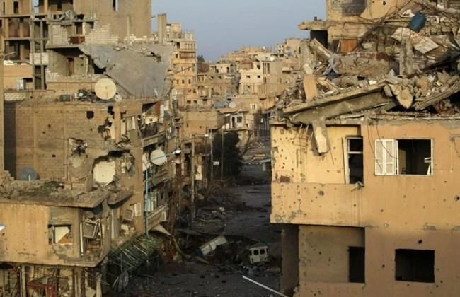 A view shows damaged buildings in Deir al-Zor, eastern Syria Feb. 19, 2014. (REUTERS)