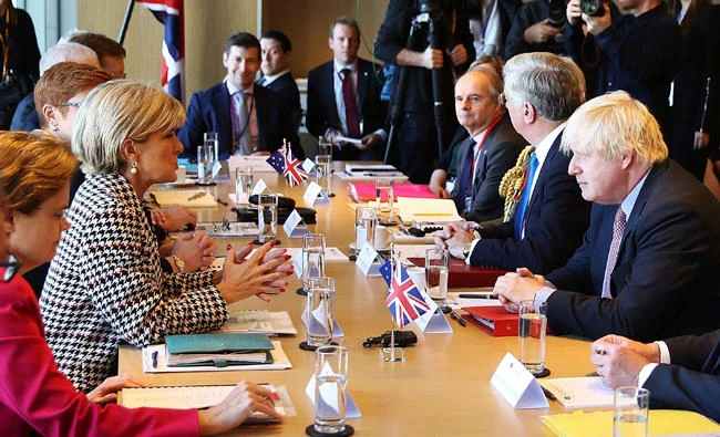 British Foreign Secretary Boris Johnson, right and Australian Foreign Minister Julie Bishop, second left, sit down for talks in Sydney, on Thursday. Johnson and Bishop will be joined by British Defense Secretary Michael Fallon and Australian Defense Minister Marise Payne for annual talks focusing on counterterrorism, Europe's future and the threat posed by North Korea. (AP)
