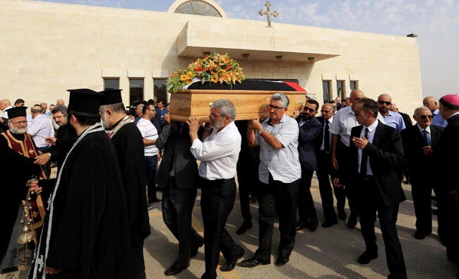 Jordanian mourners attend a funeral of Bashar Hamarneh, a doctor who was in the residential quarter of the Israeli embassy at the time of an attack on the weekend, during his funeral in Madaba on July 27, 2017 after he died of his injuries. (AFP / Khalil Mazraawi)