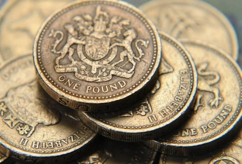 The old British one pound coins will soon be obsolete (Reuters)