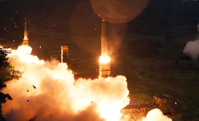This handout photo taken on July 29, 2017 and provided by South Korean Defence Ministry in Seoul shows South Korea's missile system firing Hyunmu-2 missiles into the East Sea from an undisclosed location on South Korea's east coast during a South Korea-US joint missile drill aimed to counter North Korea’s ICBM test. (AFP)