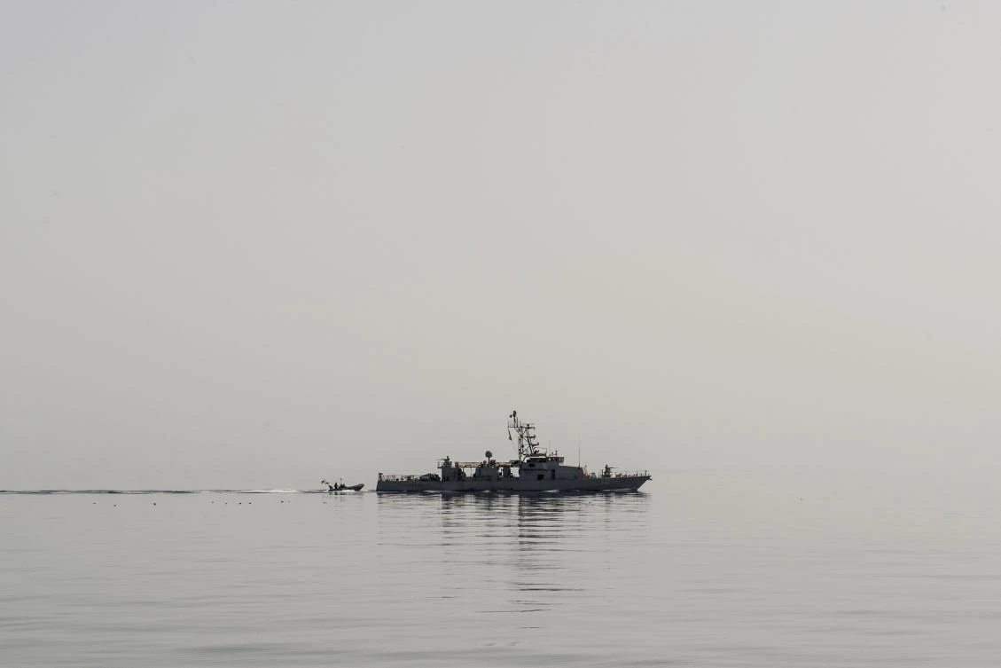 This US Navy photo obtained July 25, 2017 shows the coastal patrol craft USS Thunderbolt (PC 12) as it recovers a rigid hull inflatable boat (RHIB) during a trilateral exercise between the US, Kuwait and Iraq on March 15, 2017 in the Gulf. A US Navy patrol ship fired warning shots at an Iranian Revolutionary Guard Corps vessel in the Gulf on July 25, 2017 after it approached within 150 yards (137 meters), a US defense official said."The IRGCN boat was coming in at a high rate of speed. It did not respond to any signals, they did not respond to any bridge-to-bridge calls, they felt there was no choice except to fire the warning shots," the defense official told AFP on condition of anonymity. (AFP)