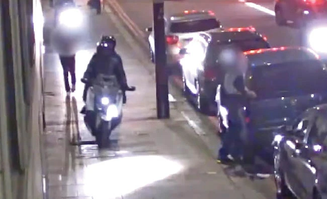 Stills from a video showing a moped gang deliberately running down a man in London, apparently to steal his watch. (Metropolitan Police)