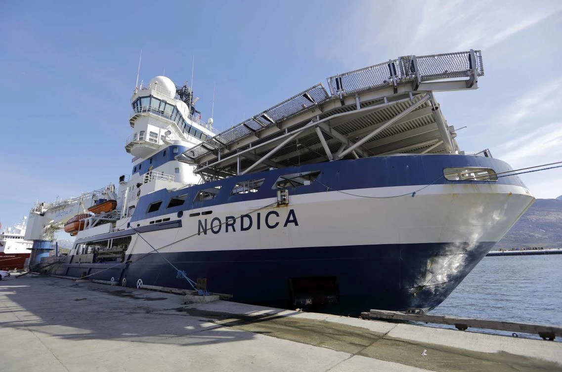 The Finnish icebreaker MSV Nordica is docked in Nuuk, Greenland, after traversing the Northwest Passage through the Canadian Arctic Archipelago, on July 29, 2017. The once-forbidding route through the Arctic, linking the Pacific and the Atlantic oceans, has been opening up sooner and for a longer period each summer due to climate change. (AP Photo/David Goldman)