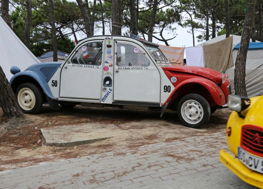 Cars are are parked at a camping site in Ericeira during the World 2017 2CV Meeting July 30, 2017. The event is held between the 26th and the 31st of July 2017, 30 years after Portugal hosted the seventh 2CV World Meeting in 1987, and will include activities ranging from an open air fair, a competition to disassemble and reassemble, an "elegance" contest for original and modofied 2CV's, a chimes concert, to a short term 2CV museum hosted by the Marfa national palace featuring vehicles from the Citroen Heritage collection purposely brought from Paris. / AFP / JOSE MANUEL RIBEIRO