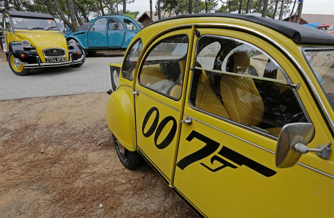 Cars are are parked at a camping site in Ericeira during the World 2017 2CV Meeting July 30, 2017. The event is held between the 26th and the 31st of July 2017, 30 years after Portugal hosted the seventh 2CV World Meeting in 1987, and will include activities ranging from an open air fair, a competition to disassemble and reassemble, an "elegance" contest for original and modofied 2CV's, a chimes concert, to a short term 2CV museum hosted by the Marfa national palace featuring vehicles from the Citroen Heritage collection purposely brought from Paris. / AFP / JOSE MANUEL RIBEIRO