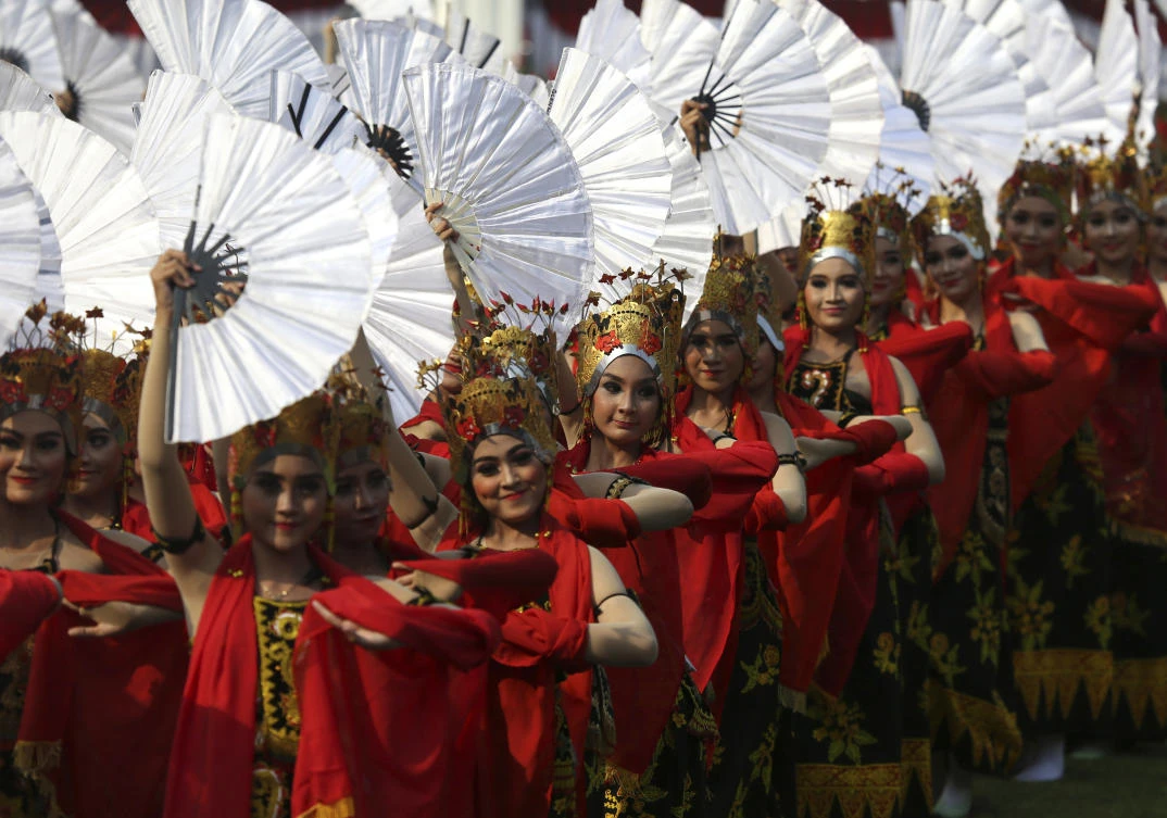 Dancers perform during the celebration of the 72nd anniversary of the country's Independence on Thursday, Aug. 17, 2017, at Merdeka Palace in Jakarta, Indonesia. Indonesia declared its independence from Dutch colonial rule in 1945. (AP Photo/Dita Alangkara)