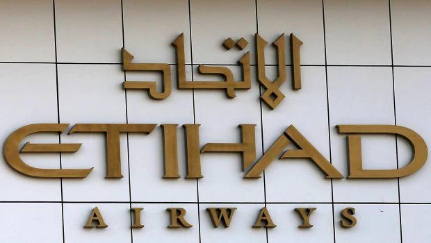 A picture taken on March 13, 2013 shows the logo on the wall of the Etihad Airways Headquarters in Abu Dhabi on March 13, 2014. (AFP)