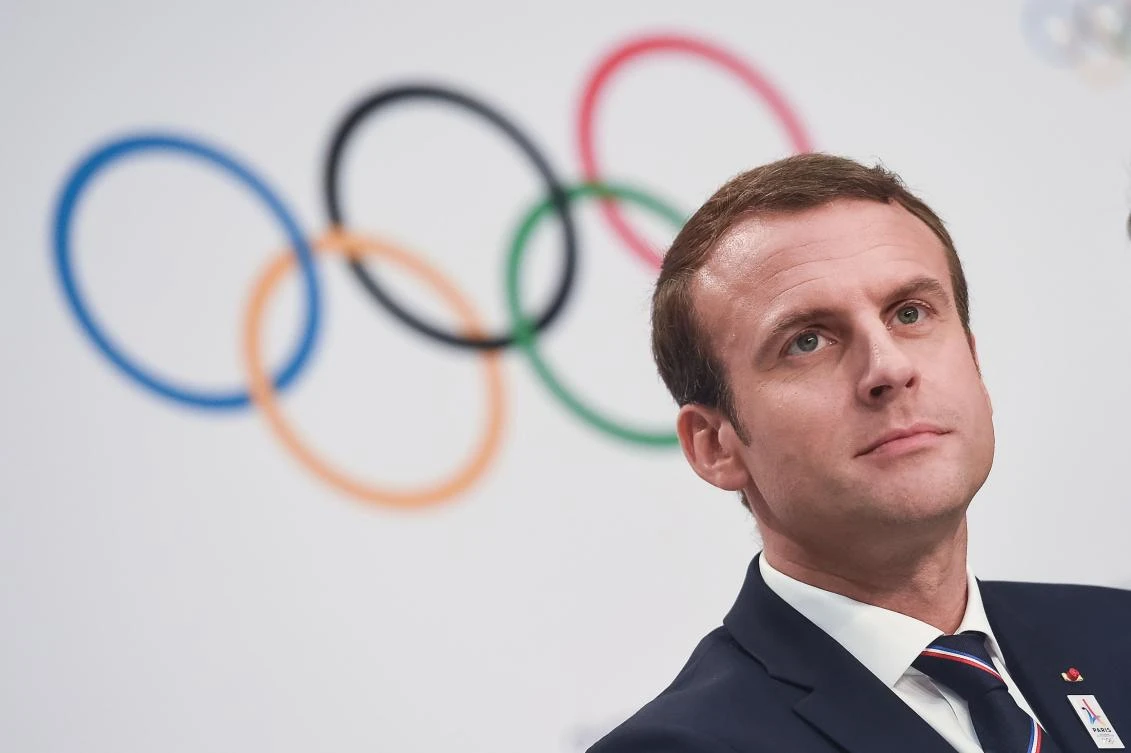 (FILES) This file photo taken on July 11, 2017 shows French President Emmanuel Macron at a press conference following the Paris 2014 bid presentation before the International Olympic Committee (IOC) members in Lausanne. Los Angeles has agreed terms with Olympic officials on a deal that will bring the Summer Games to Southern California in 2028 instead of 2024, city officials told AFP on July 31, 2017.The agreement opens the door for Paris, Los Angeles' only rival in bidding for 2024, to host the Games in seven years. The deal also will bring the Summer Olympics to Los Angeles for a third time, after the city staged the games in 1984 and 1932. (AFP)