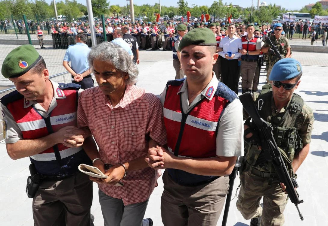 Nearly 500 people appeared in court on August 1 in the biggest trial yet of suspects from Turkey’s failed coup, facing charges of conspiring to oust the government from an air base seen as the plotters’ hub. (AFP)