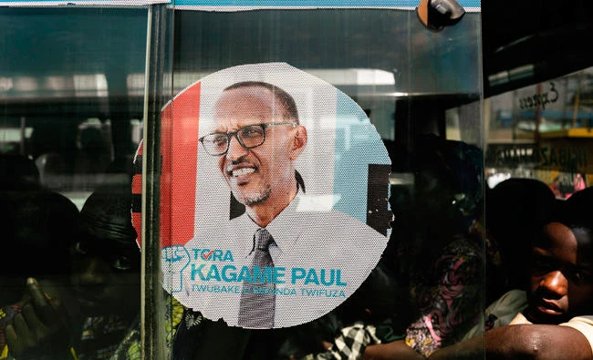 A bus adorned with an image of incumbent Rwandan President Paul Kagame at the central bus station in Kigali, in this July 30 photo. (AFP)