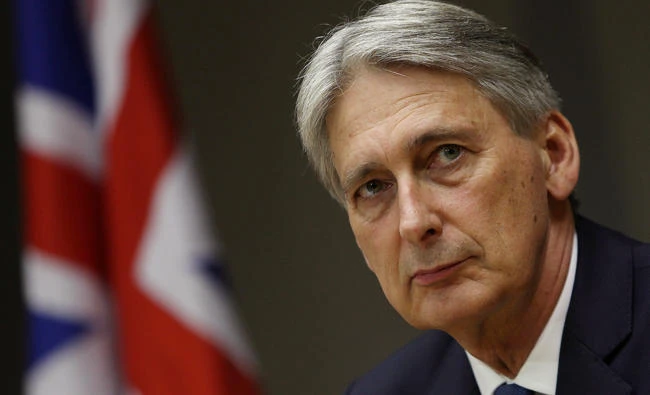 Britain's Chancellor of the Exchequer Philip Hammond attends a meeting with Brazil's Finance Minister Henrique Meirelles (unseen) in Brasilia, Brazil, July 31, 2017. (REUTERS/Adriano Machado)