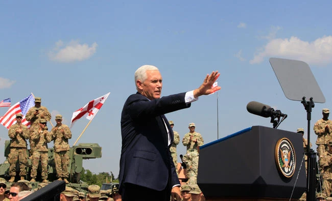 US Vice President Mike Pence addresses servicemen participating in the Noble Partner 2017 joint multinational military exercises outside Tbilisi, Georgia, on Tuesday, Aug. 1, 2017. (AP Photo/Shakh Aivazov, pool)