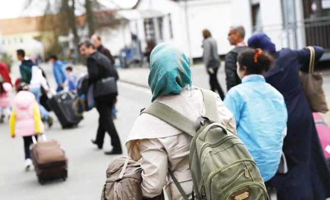 Refugees arrive at the camp for refugees and migrants in Friedland, Germany in this file photo. (Reuters)