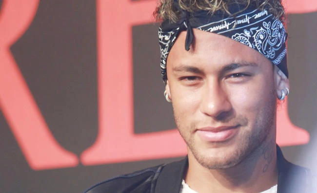 Barcelona soccer player Neymar attends a fashion event in Shanghai, China, on Monday. (Reuters)
