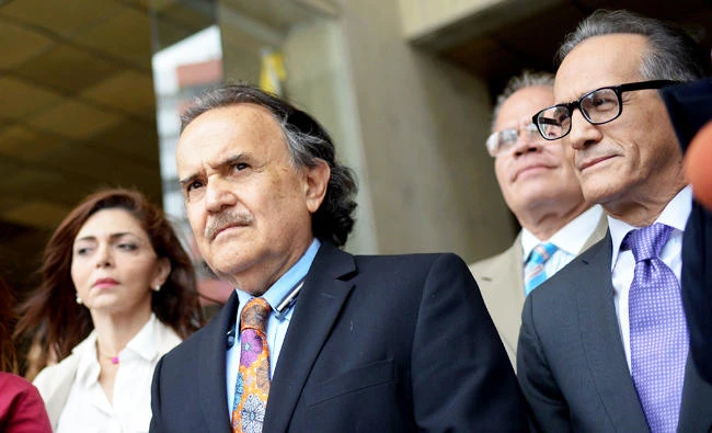 Omar Estacio (2-R), lawyer of opposition leader Antonio Ledezma, is pictured outside the Supreme Court building in Caracas on August 1, 2017. (AFP)