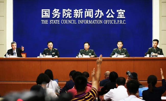 China's Defence Ministry spokesman Wuqian (R) and Central Military Commission officers including Senior Colonel Lu Yu (2nd L), Zhang Chengwen (2nd R) and Major General Zhou Shangping (center), attend a news conference in Beijing, China, in this July 24, 2017 photo. (Reuters)