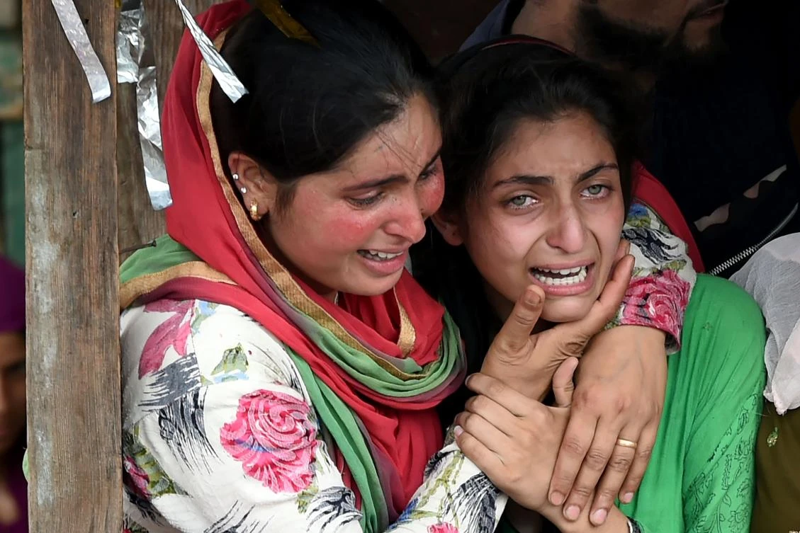 Kashmiri villagers mourn during a funeral of rebel Arif Lelhari at Lelhar village in Pulwama, south of Srinagar, on August 1, 2017. Indian forces killed a top militant commander in Kashmir on August 1, triggering clashes in which one protester was killed and dozens injured. (AFP)
