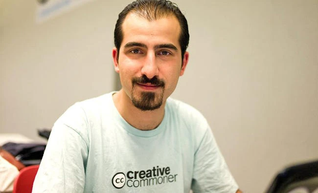 Bassel Khartabil Safadi is shown on a photo posted on social media by his relatives demanding his release from prison.