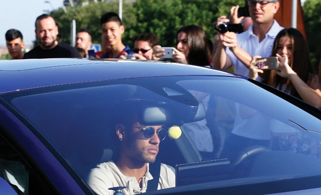 FC Barcelona's Neymar arrives at the Sports Center FC Barcelona Joan Gamper in Sant Joan Despi, Spain, Wednesday. (AP)