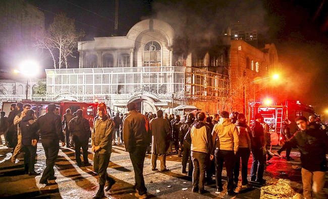 Smoke rises from Saudi Arabia's embassy during a demonstration in Tehran, in this January 2, 2016 file photo. (Reuters)