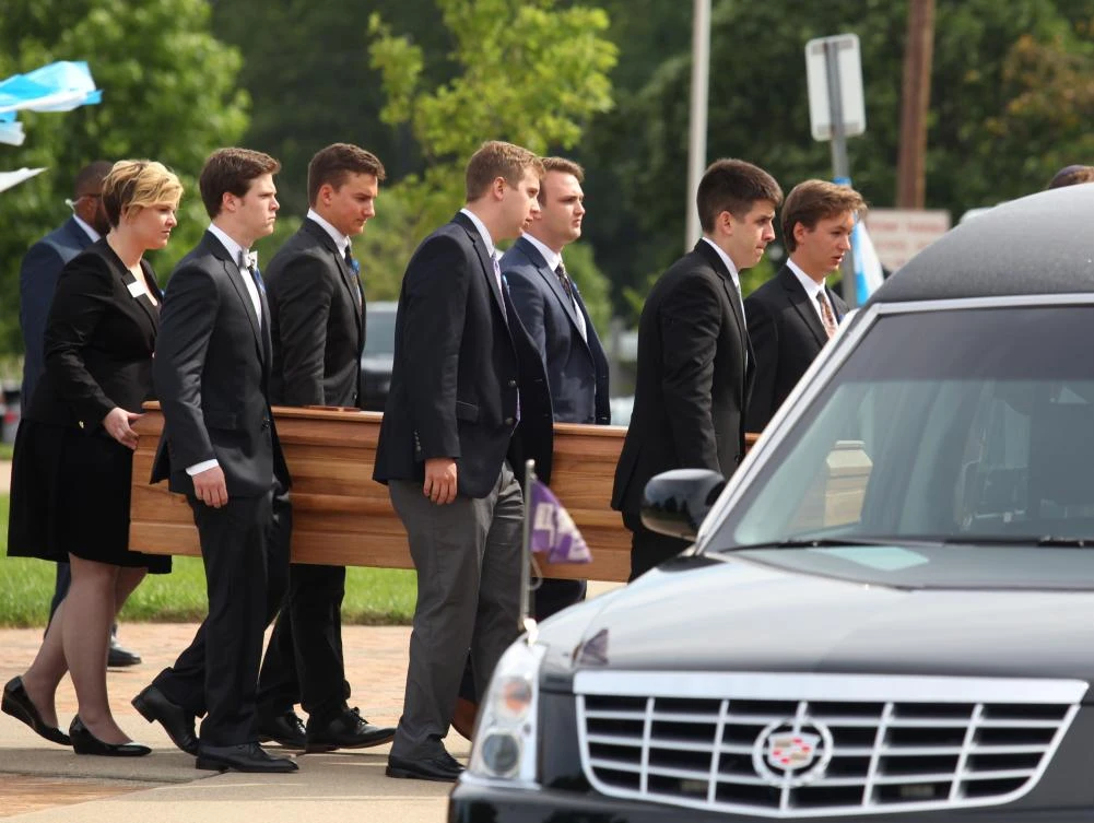 (FILES) This file photo taken on June 22, 2017 shows the casket carrying the remains of Otto Warmbier as it is carried out of Wyoming High School in Wyoming, Ohio on June 22, 2017, following the funeral for Otto Warmbier. The United States on August 2, 2017 officially set a September 1 start date for a ban prohibiting its citizens from traveling to North Korea."The Department of State has determined that the serious risk to United States nationals of arrest and long-term detention represents imminent danger to the physical safety of United States nationals traveling to and within the Democratic People's Republic of Korea (DPRK)," read the restriction as it appeared Wednesday in the US government's Federal Register.The travel ban was first announced last month in the wake of the death of American student Otto Warmbier who fell into a coma after being imprisoned by Pyongyang during a tourist visit. / AFP / Paul Vernon