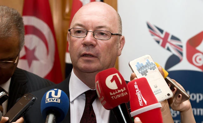 Alistair Burt, British minister of state for the Middle East and North Africa, speaks to journalists in Tunis on Thursday. (AFP)