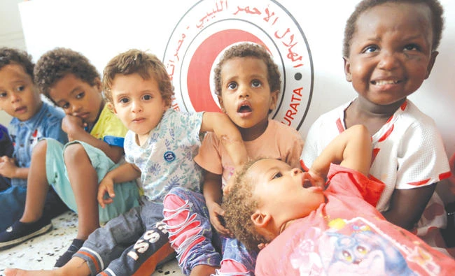 Children of Daesh fighters currently living in the Libyan Red Crescent headquarters in Misrata.(AFP)