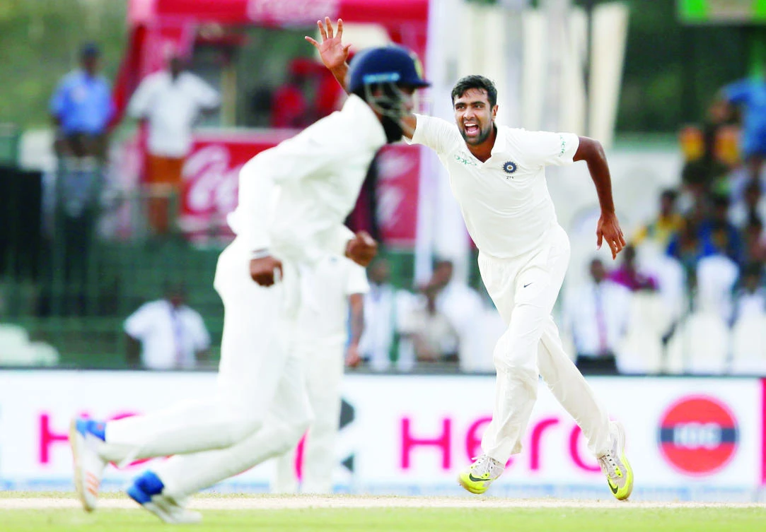 India’s Ravichandran Ashwin and Lokesh Rahul celebrate after taking the wicket of Sri Lanka’s Upul Tharanga during a Test match in Colombo on Friday. (Reuters)