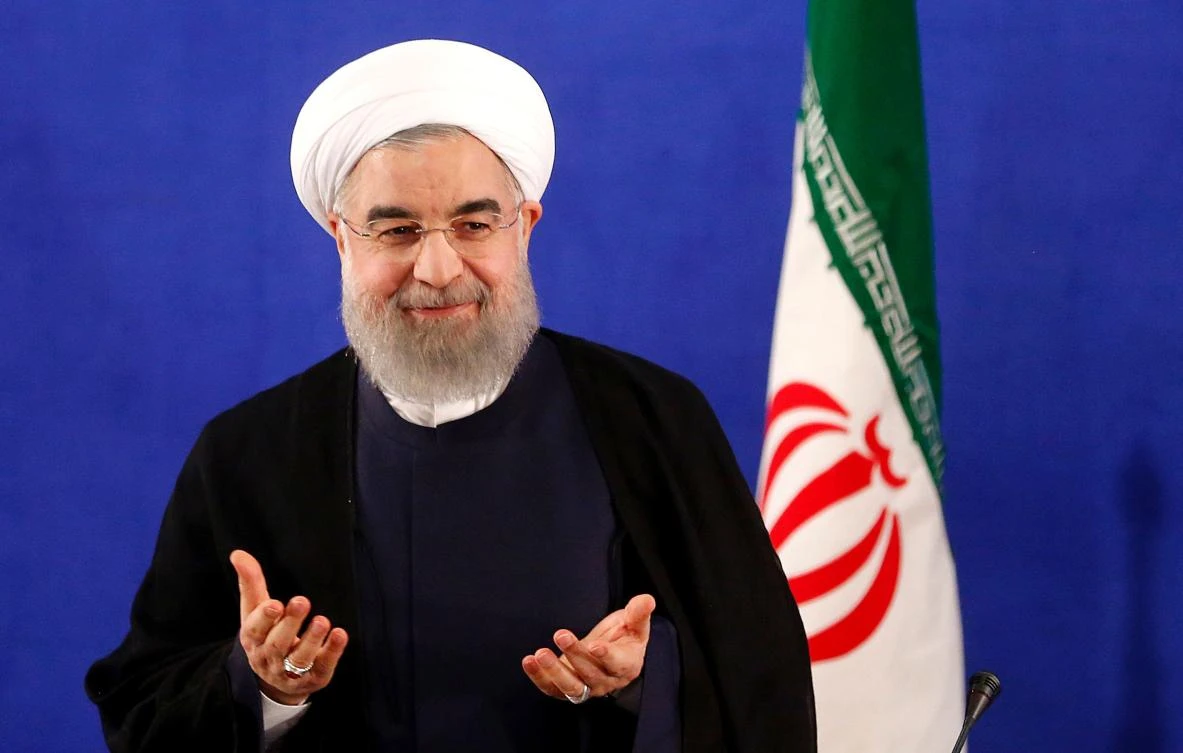 (FILES) This file photo taken on May 22, 2017 shows Iranian President Hassan Rouhani arriving to hold a press conference in Tehran. Rouhani was officially sworn in for a second term on August 3, 2017 at a ceremony overseen by supreme leader Ayatollah Ali Khamanei. (AFP)