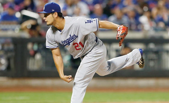 Los Angeles Dodgers starting pitcher Yu Darvish throws against New York Mets in the seventh inning at Citi Field Friday. (USA TODAY Sports)