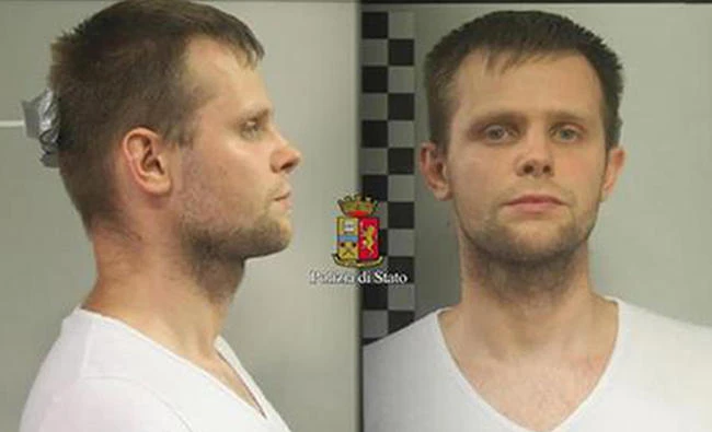 Photo released by police of a man identified as identified as Lukasz Pawel Herba, a Polish citizen with British residency, who has been arrested in the alleged kidnapping of a young British model who thought she was coming to Milan for a photo shoot, but instead was drugged, hustled away in a suitcase and handcuffed in a house in northern Italy before being released, Milan police said on Saturday. (AP)