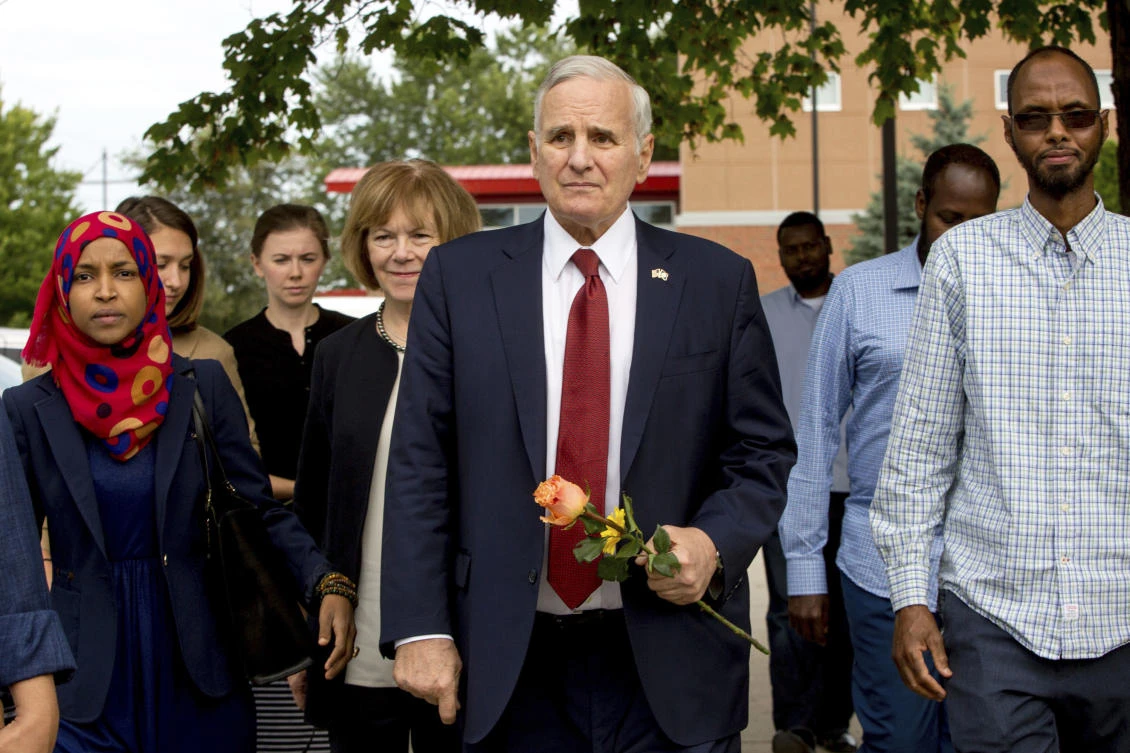 Minnesota Gov. Mark Dayton appears at a news conference at the Dar Al Farooq Islamic Center in Bloomington, Minn., on Sunday, Aug. 6, 2017, where an explosion damaged a room and shattered windows as worshippers prepared for morning prayers early Saturday. (Courtney Pedroza/Star Tribune via AP)