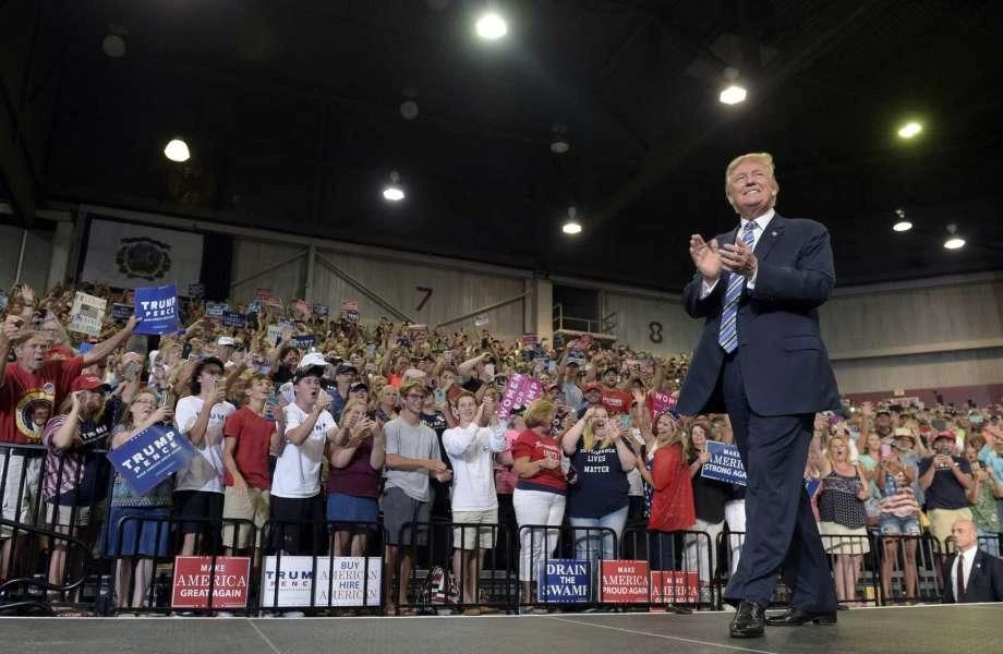 Trump appeals to loyalists as support slips, agenda stalls