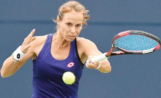Varvara Lepchenko of the US hits a shot against Jelena Ostapenko of Latvia during the Rogers Cup tennis tournament at Aviva Center Monday. (USA TODAY Sports)