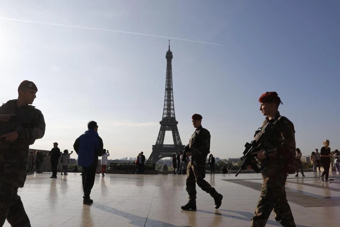 This file photo taken on April 23, 2017 shows French soldiers of the "Operation Sentinelle" patrolling in front of the Eiffel tower in Paris. (AFP)