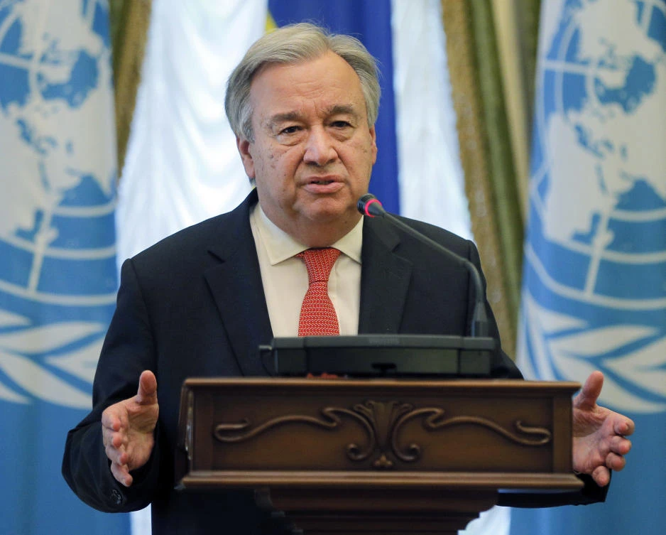 FILE - In this Sunday, July 9, 2017, file photo, United Nation Secretary-General Antonio Guterres speaks during a joint press conference with Ukrainian President Petro Poroshenko in Kiev, Ukraine. Guterres will make his first visit to Israel and the Palestinian territories as U.N. secretary-general later this month for a firsthand look at a conflict that has been on the front burner of the United Nations for 70 years. The Palestinian ambassador to the United Nations, Riyad Mansour, said Tuesday, Aug. 8 that the trip "comes at a critical time in which there are attacks against the two-state solution," which would see an independent Palestinian state existing side-by-side with Israel in peace. (AP Photo/Efrem Lukatsky, File)