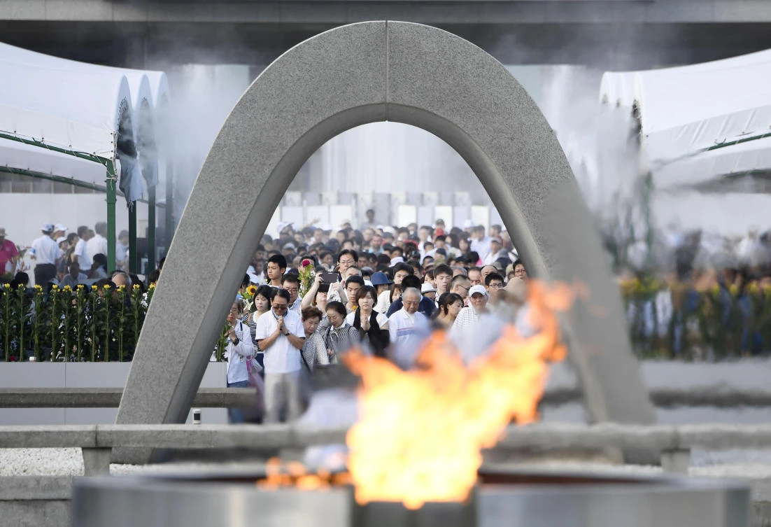 People offer prayers at the Peace Memorial Park in Hiroshima, western Japan, Sunday, Aug. 6, 2017, to mark the 72nd anniversary of the world's first atomic bombing that killed 140,000 people in 1945. Hiroshima's appeal of "never again" on the 72nd anniversary has acquired renewed urgency as North Korea moves ever closer to acquiring nuclear weapons. (AP)