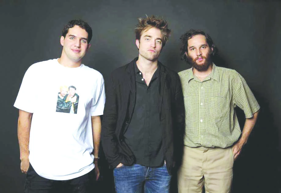 Co-director Ben Safdie, from left, actor Robert Pattinson, and co-director Joshua Safdie pose for a portrait to promote their film, “Good Time” at the Four Seasons Hotel
in Los Angeles. (AP)