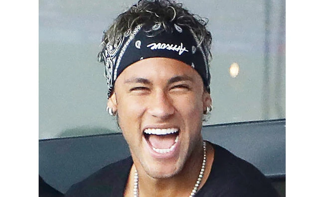 Paris Saint-Germain's Brazilian forward Neymar reacts during the French L1 football match between PSG and Amiens (ASC) at the Parc de Princes Stadium in Paris. (AFP)