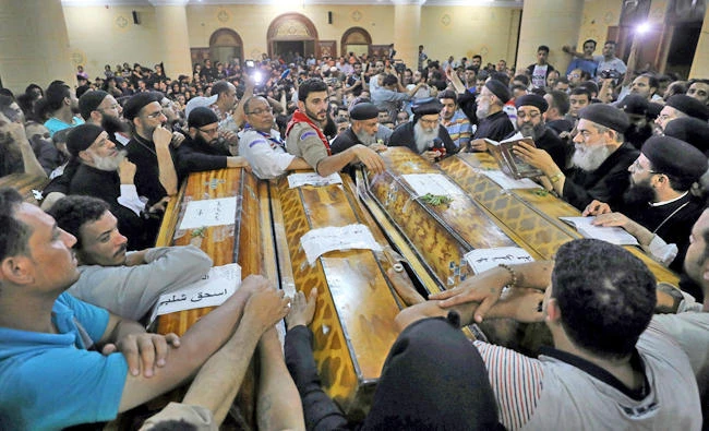 Mourners gather at the Sacred Family Church for the funeral of Coptic Christians who were killed in Minya, Egypt, on May 26, 2017. (REUTERS file photo)