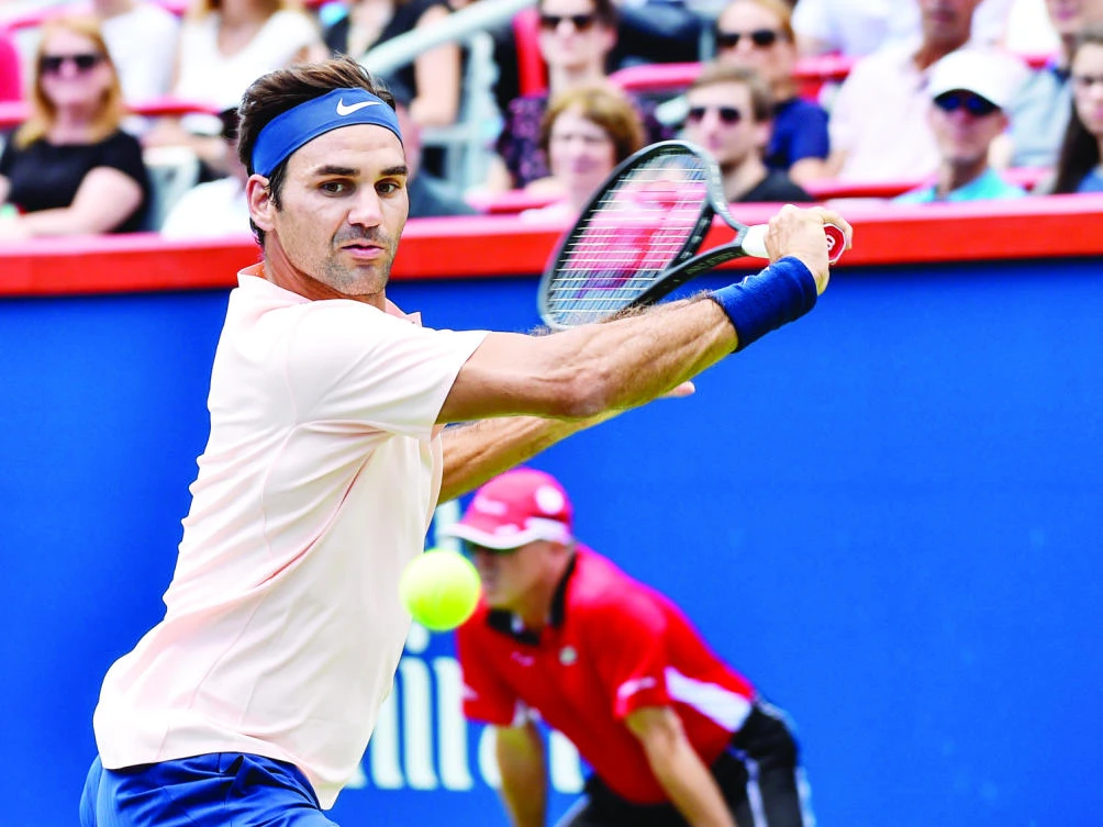Roger Federer of Switzerland prepares to return the ball against Peter Polansky of Canada during day six of the Rogers Cup presented by National Bank at Uniprix Stadium on Wednesday. (AFP)