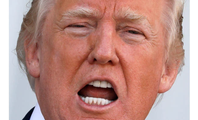 US President Donald Trump speaks to reporters about North Korea at Trump’s golf estate in Bedminster, New Jersey, US, on August 10, 2017. (REUTERS/Jonathan Ernst)