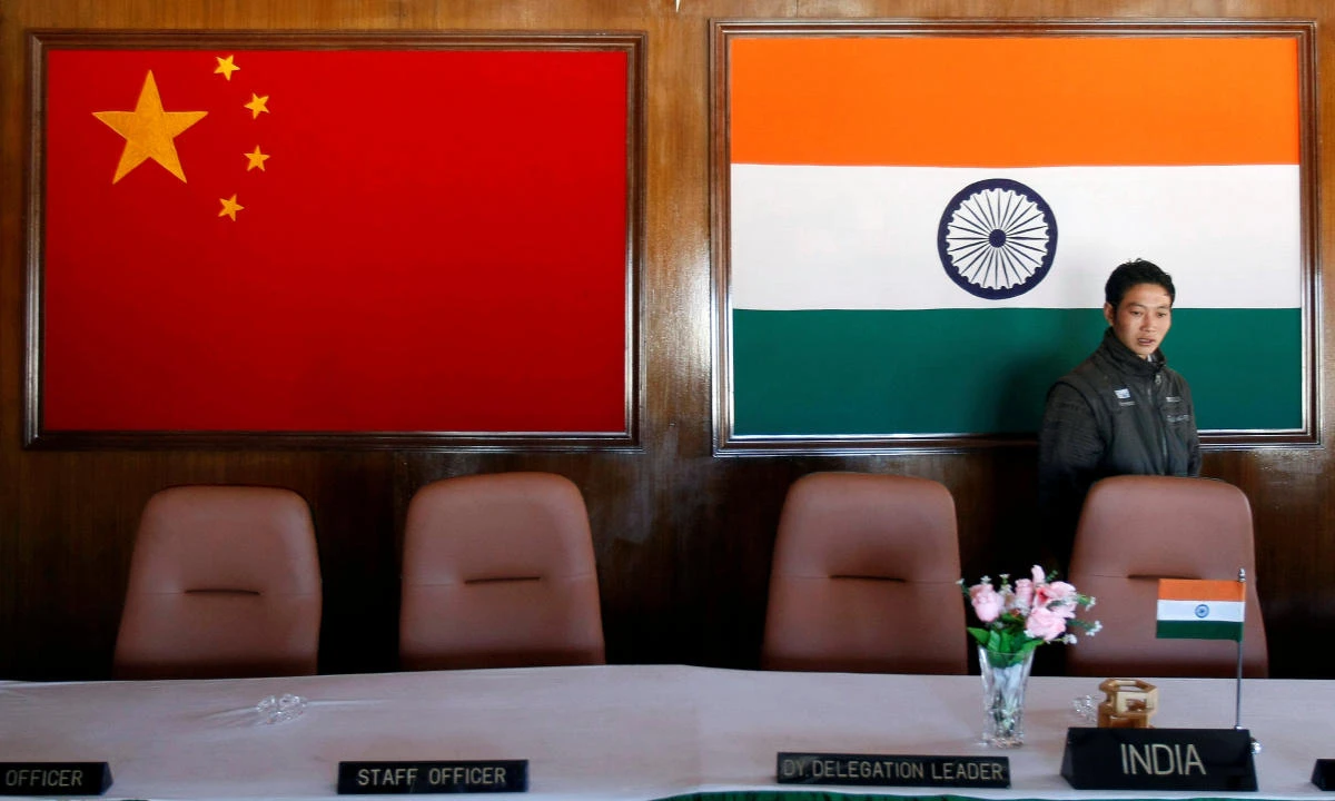 FILE PHOTO: A man walks inside a conference room used for meetings between military commanders of China and India, at the Indian side of the Indo-China border at Bumla, in the northeastern Indian state of Arunachal Pradesh, November 11, 2009. (REUTERS)